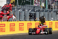 Sebastian Vettel, Ferrari SF70H, race winner, takes the chequered flag