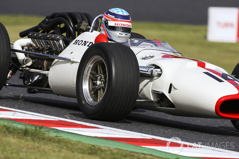 Takuma Sato drives a Honda RA300