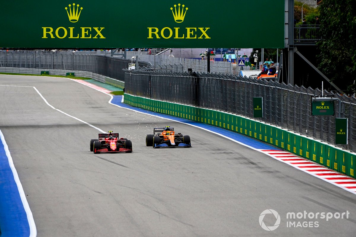 Carlos Sainz Jr., Ferrari SF21, battles with Lando Norris, McLaren MCL35M