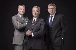 Sean Bratches, Managing Director, Commercial Operations; Chase Carey, Chairman and CEO of Formula 1; Ross Brawn, Managing Director, Motor Sports