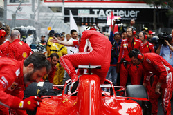 Sebastian Vettel, Ferrari, exits his car on the grid