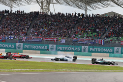 Lewis Hamilton, Mercedes AMG F1 W07 Hybrid leads at the start of the race as Nico Rosberg, Mercedes
