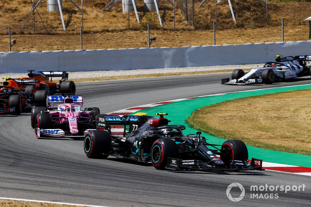 Valtteri Bottas, Mercedes F1 W11 EQ Performance, leads Sergio Perez, Racing Point RP20, Alex Albon, Red Bull Racing RB16, Carlos Sainz Jr., McLaren MCL35, and Pierre Gasly, AlphaTauri AT01