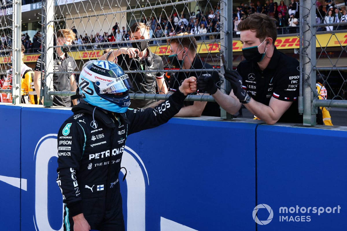 Pole man Valtteri Bottas, Mercedes, celebrates with his team