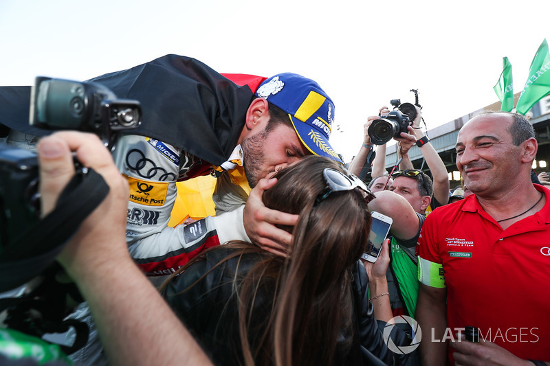 Daniel Abt, Audi Sport ABT Schaeffler, wins the Berlin ePrix, celebrates by kissing his girlfriends