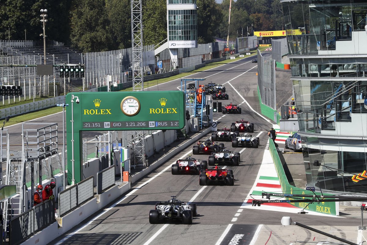 The drivers head for the pit lane exit at the start of the session