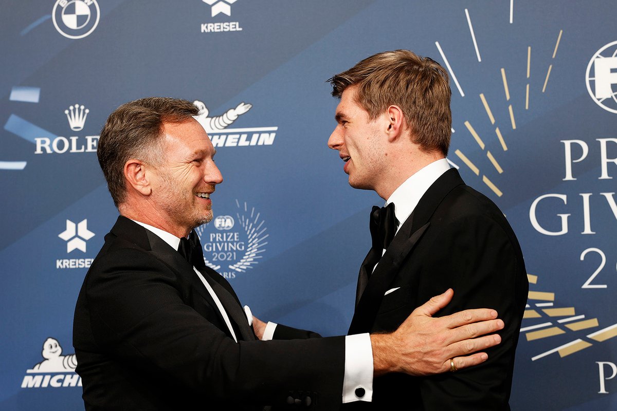 Team Principal Red Bull Racing, Christian Horner, bersama juara dunia Formula 1 2021, Max Verstappen dalam event FIA Prize Giving Ceremony.
