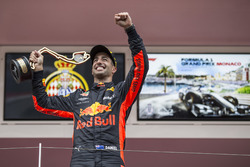 Race winner Daniel Ricciardo, Red Bull Racing celebrates on the podium with the trophy