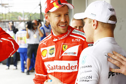 Sebastian Vettel, Ferrari, Valtteri Bottas, Mercedes AMG F1, after the session