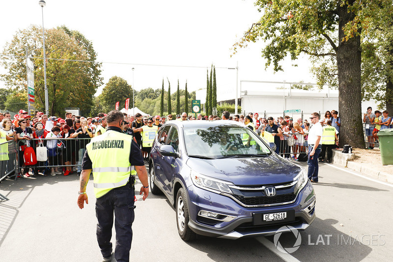 Fernando Alonso, McLaren, arrives at the circuit