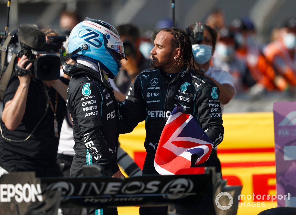 Lewis Hamilton, Mercedes, 1st position, and Valtteri Bottas, Mercedes, 3rd position, congratulate each other in Parc Ferme