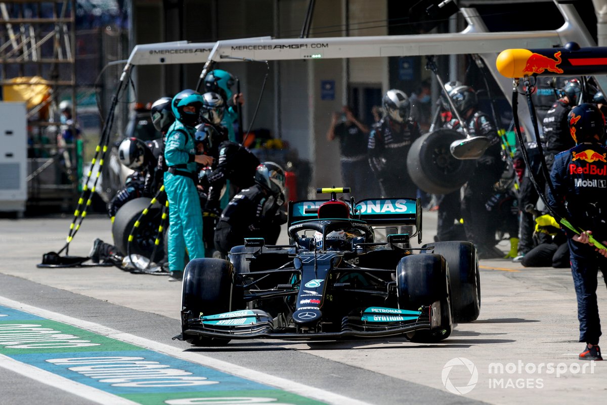 Valtteri Bottas, Mercedes W12, leaves his pit box after a stop