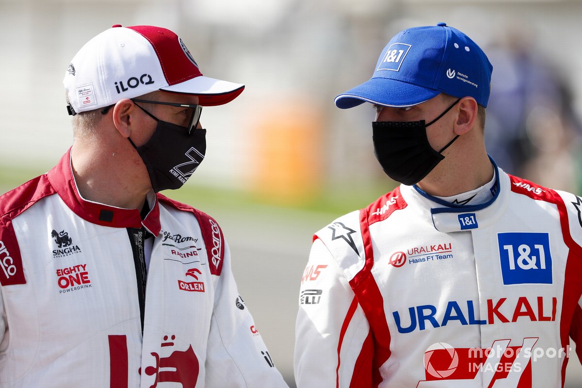 Kimi Raikkonen, Alfa Romeo and Mick Schumacher, Haas F1