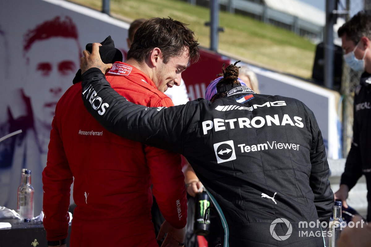 Charles Leclerc, Ferrari, 2nd position, and Lewis Hamilton, Mercedes, 1st position, in Parc Ferme