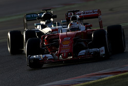 Sebastian Vettel, Scuderia Ferrari e Nico Rosberg, Mercedes AMG F1 Team