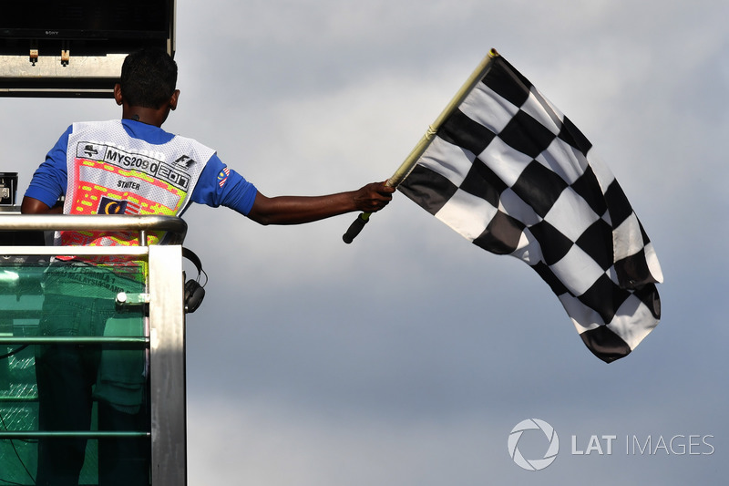 Chequered flag is waved