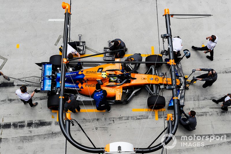 Lando Norris, McLaren MCL34, in the pits during practice