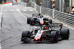 Kevin Magnussen, Haas F1 Team VF-18, leads Romain Grosjean, Haas F1 Team VF-18