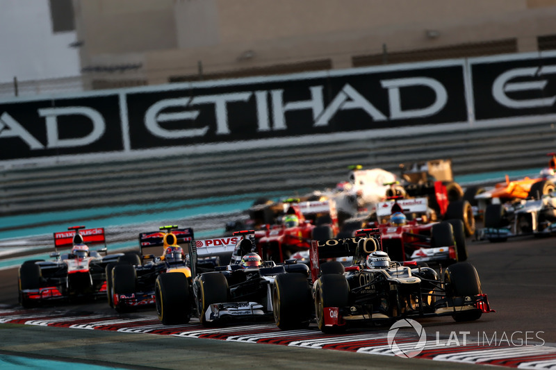 Kimi Raikkonen, Lotus E20 F1 Team, leads Pastor Maldonado, Williams FW34, Mark Webber, Red Bull Rac