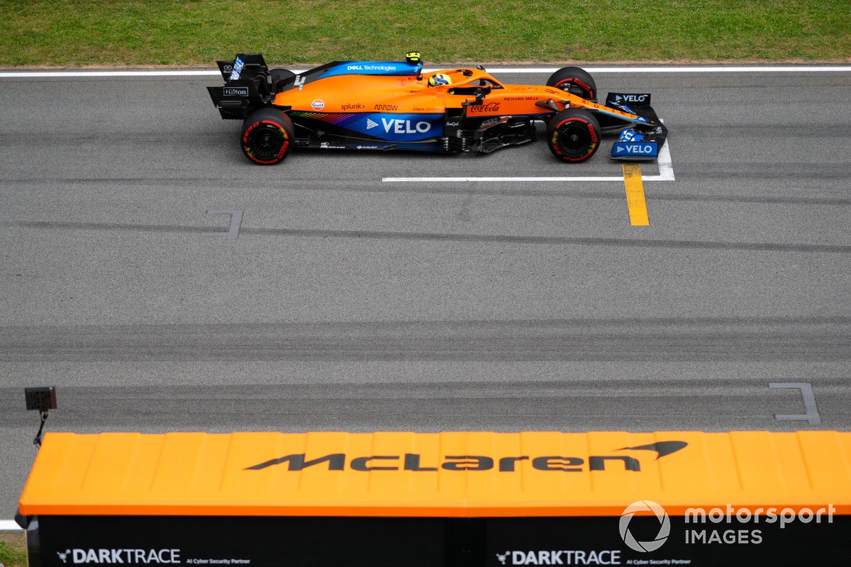 Lando Norris, McLaren MCL35M, passes the MecLaren pit wall