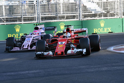 Sebastian Vettel, Ferrari SF70H, Esteban Ocon, Sahara Force India VJM10