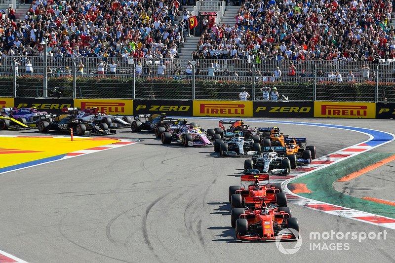 Sebastian Vettel, Ferrari SF90, leads Charles Leclerc, Ferrari SF90, Lewis Hamilton, Mercedes AMG F1 W10, Carlos Sainz Jr., McLaren MCL34, Valtteri Bottas, Mercedes AMG W10, Lando Norris, McLaren MCL34 and the rest of the pack at the start
