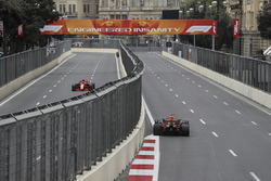 Kimi Raikkonen, Ferrari SF71H amd Max Verstappen, Red Bull Racing RB14