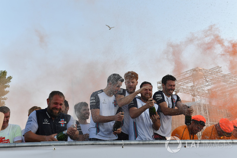 Williams celebrate on the podium at the raft race