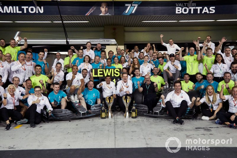 Lewis Hamilton, Mercedes AMG F1, Valtteri Bottas, Mercedes AMG F1, Toto Wolff, Executive Director (Business), Mercedes AMG, and the entire Mercedes team at the track celebrate victory in the race and the Championships