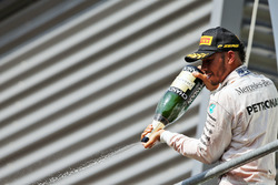 Podium: Lewis Hamilton, Mercedes AMG F1 celebrates his third position with the champagne on the podium