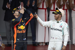 Race winner Daniel Ricciardo, Red Bull Racing, drinks from his shoe with Lewis Hamilton, Mercedes AMG F1
