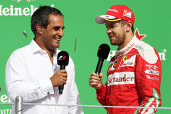(L to R): Juan Pablo Montoya, on the podium with Sebastian Vettel, Ferrari