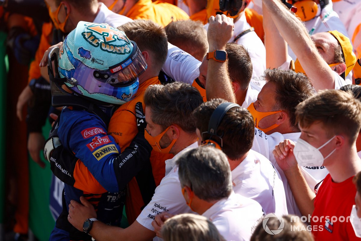 Daniel Ricciardo, McLaren, 1st position, celebrates with his team in Parc Ferme