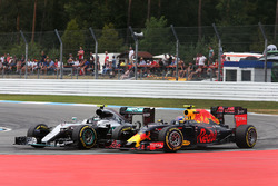 Nico Rosberg, Mercedes AMG F1 W07 Hybrid and Max Verstappen, Red Bull Racing RB12 battle for position
