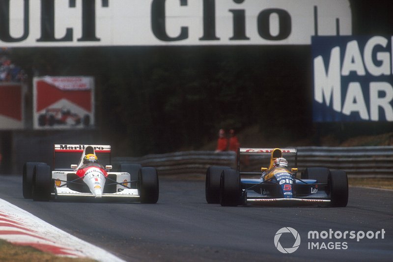 Nigel Mansell, Williams FW14 Renault, adelanta a Ayrton Senna, McLaren MP4/6 Honda.