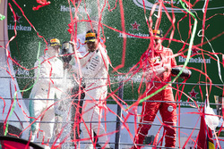 Second place Valtteri Bottas, Mercedes AMG F1, Race winner Third place Lewis Hamilton, Mercedes AMG F1 Sebastian Vettel, Ferrari, celebrate, Champagne on the podium