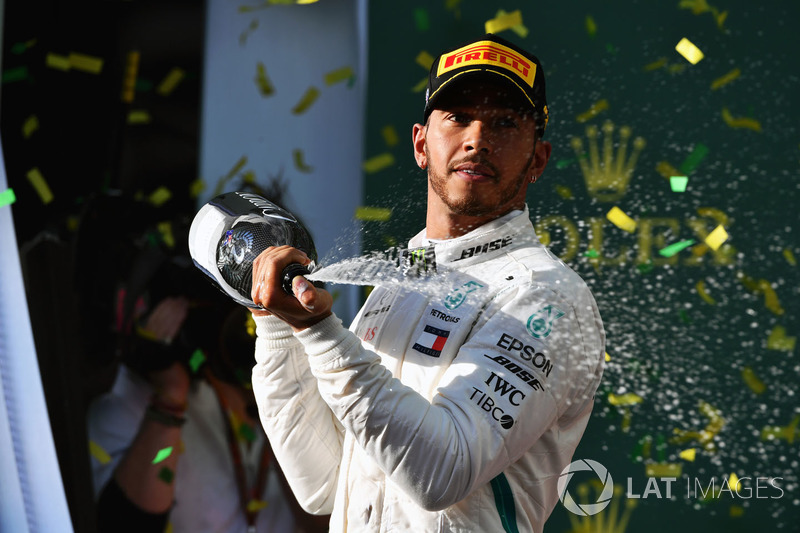 Lewis Hamilton, Mercedes-AMG F1 celebrates on the podium with the champagne