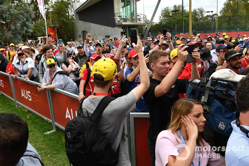Fans outside the paddock