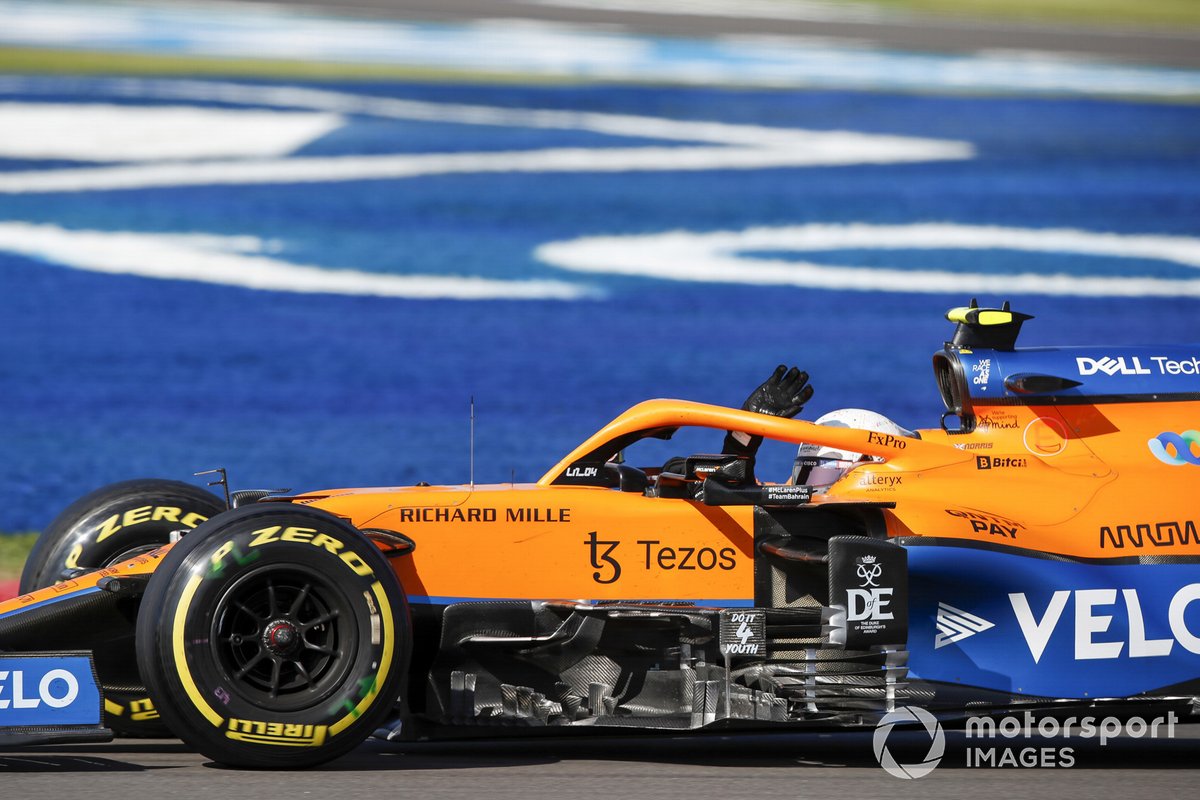 Lando Norris, McLaren MCL35M, waves from his cockpit after the sprint race