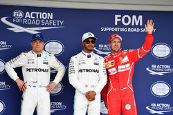 (L to R): Valtteri Bottas, Mercedes AMG F1, pole sitter Lewis Hamilton, Mercedes AMG F1 and Sebastian Vettel, Ferrari celebrate in parc ferme