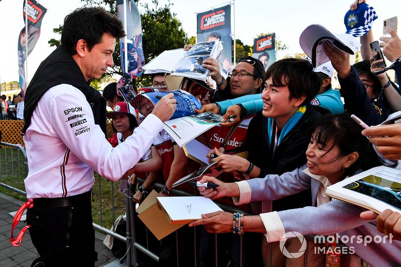 Toto Wolff, Executive Director (Business), Mercedes AMG signs an autograph for a fan