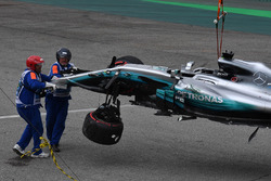 The crashed car of Lewis Hamilton, Mercedes-Benz F1 W08 is recovered in Q1