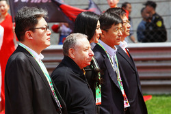 Jean Todt, FIA President on the grid with Fan Bingbing, Actress