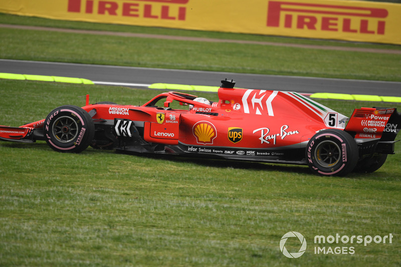 Sebastian Vettel, Ferrari SF71H runs wide across the grass
