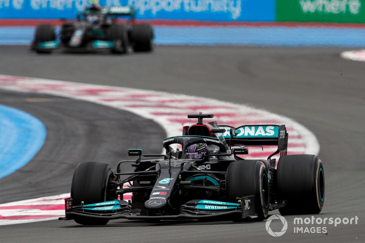 Sir Lewis Hamilton, Mercedes W12, leads Valtteri Bottas, Mercedes W12