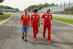 Sebastian Vettel, Ferrari and Riccardo Adami, Ferrari Race Engineer walk the track