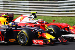 Боротьба за позицію між Максом Ферстаппеном, Red Bull Racing RB12 та Кімі Райкконеном, Ferrari SF16-