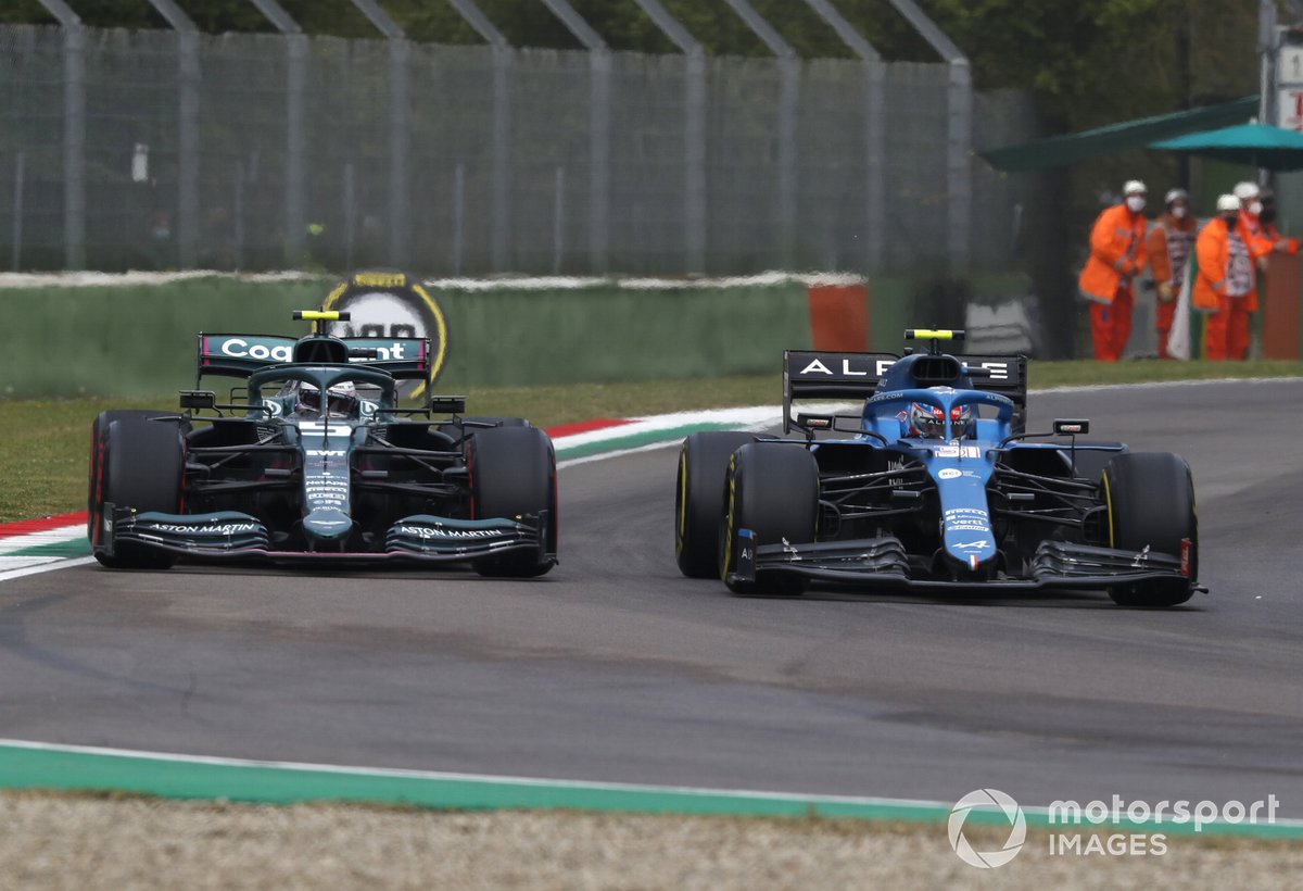 Esteban Ocon, Alpine A521, battles with Sebastian Vettel, Aston Martin AMR21