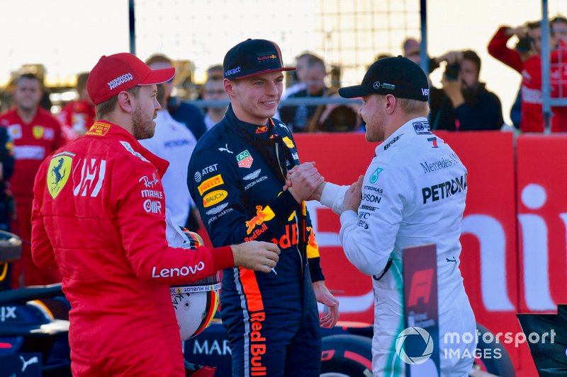Top 3 Qualifiers Sebastian Vettel, Ferrari, Max Verstappen, Red Bull Racing, and pole man Valtteri Bottas, Mercedes AMG F1, on the grid after Qualifying