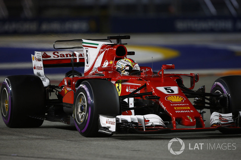 Pole man Sebastian Vettel, Ferrari SF70H, celebrates on his way to Parc Ferme